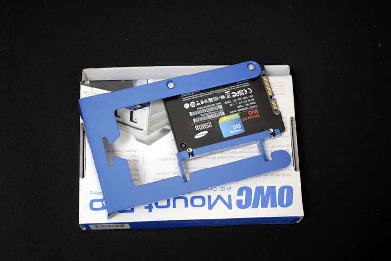 A 2.5" SSD in the correct mounting frame for a Mac Pro